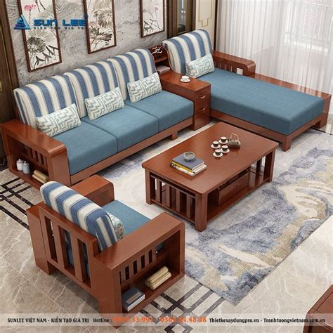 living room with blue and white striped couches, coffee table and end ...