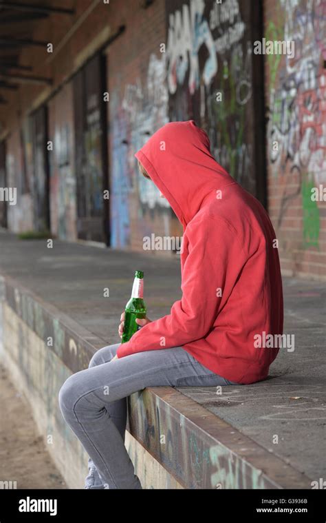 young person drinking beer Stock Photo - Alamy