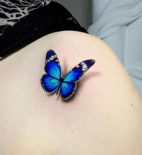 Blue Butterfly Tattoo On Dark Skin - Kagutaba