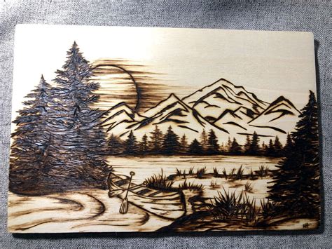 Canoe in the mountains wood burned art | Wood burning art, Wood burn ...