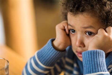 Close up of crying little black boy. | ACEonline, LLC