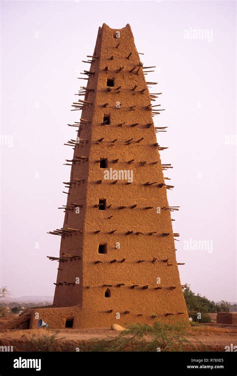 Agadez, Niger. Minaret of the Mosque of Agadez. The poles are for ...