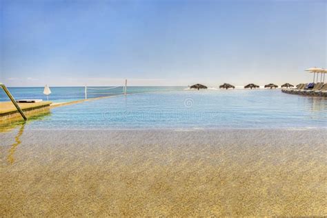 Infinity Pool on the Beach stock image. Image of vacation - 275484333