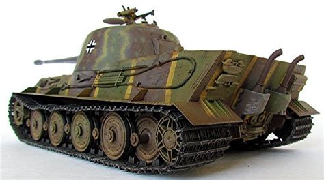 a toy model of a tank on a white surface