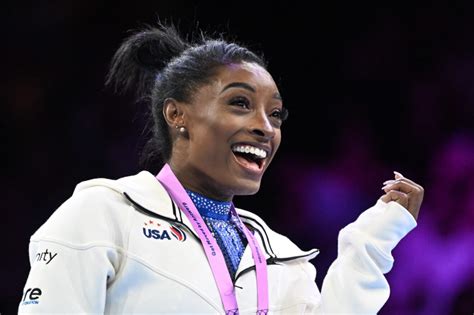 Simone Biles once again shines bright in the city of diamonds, winning ...