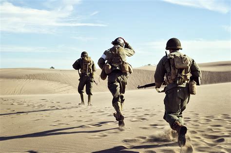 Three WWII Soldiers Running In The Desert Sand Photograph by Kriss ...