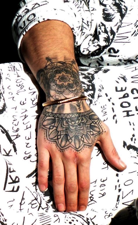 Close up on Zayn's LEFT arm tattoo. This must be a mirror image ...