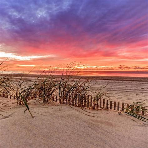 Sunrise over the beach on beautiful LBI | Beach, Sunrise, Beautiful beaches