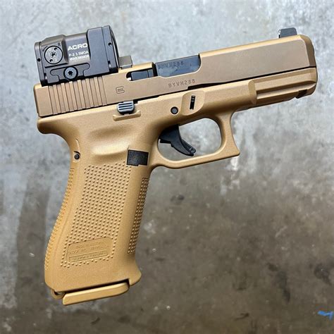 GLOCK 19X with AIMPOINT ACRO P2, suppressor height sights, and ...