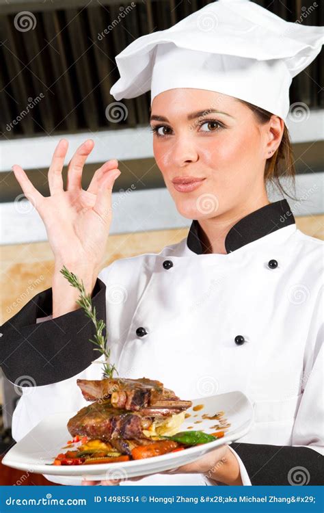 Female Chef Presenting Food Stock Images - Image: 14985514