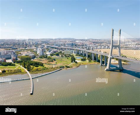 Aerial View Of Vasco da Gama Bridge And High Car Traffic In Lisbon City ...