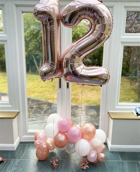 12th birthday balloons with lovely arch and rose gold number balloons ...