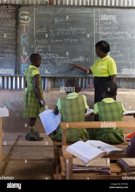 A teacher at a Bridge International Academies primary school in Mpigi ...