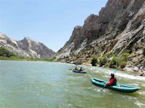 What to Wear Kayaking: Guide to All-Season River Paddling - RiverBent