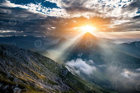 The sun rising behind the mountain 4918461 Stock Photo at Vecteezy