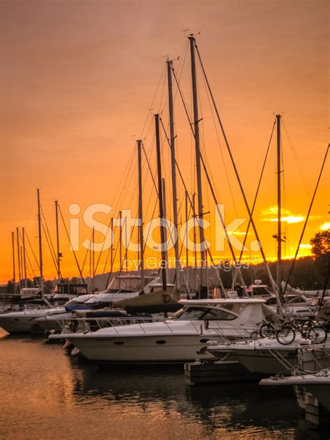 Sailboats At Sunset In A Marina Stock Photo | Royalty-Free | FreeImages