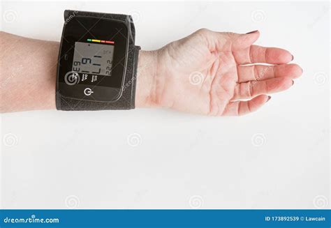 Arm with Wrist Blood Pressure Cuff with Reading Stock Image - Image of ...