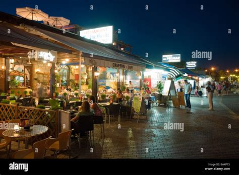 Restaurant, cafe along the harbour promenade at night, Paphos, South ...