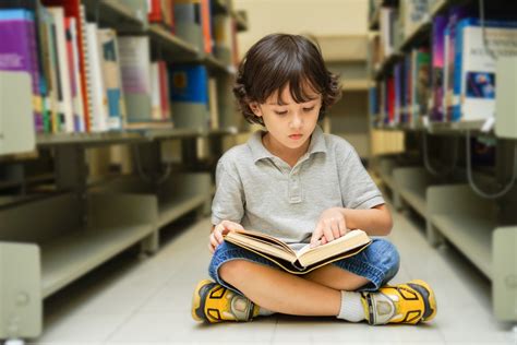 Reading a good book each day could boost kids’ academic performance ...