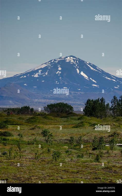 The infamous Hekla volcano towers above the landscape of South Iceland ...