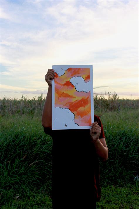 orange and yellow clouds on Behance