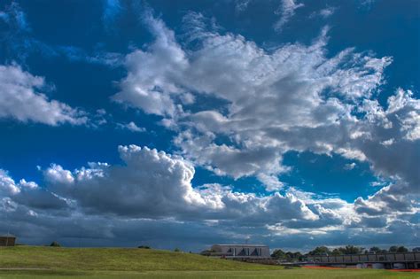 Green Field Under White Stratus Clouds at Daytime · Free Stock Photo