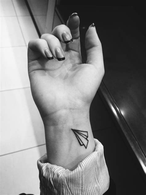 My new wrist tattoo! Love my paper plane... Cool Wrist Tattoos, Tiny ...