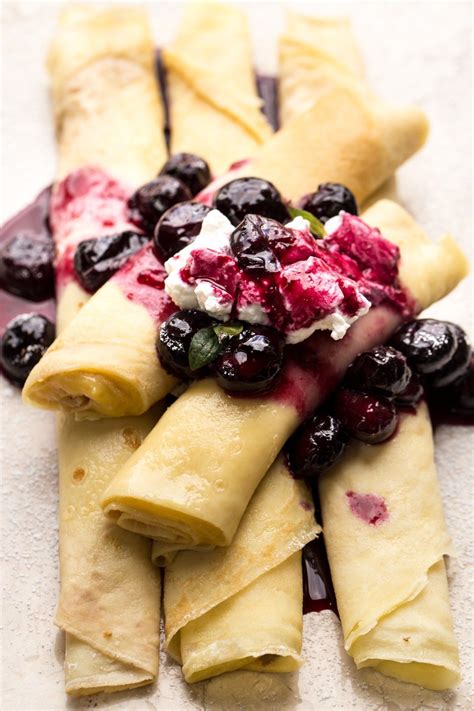 The best crepes recipe with a custard filling, and a blueberry sauce ...