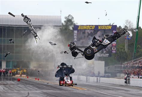 Larry Dixon's Top Fuel Dragster crashes during qualifying for the 2015 ...