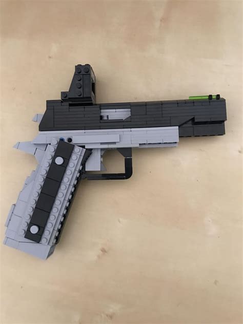 Colt M1911 I built using Jim’s Lego Guns tutorial. Other than a few ...