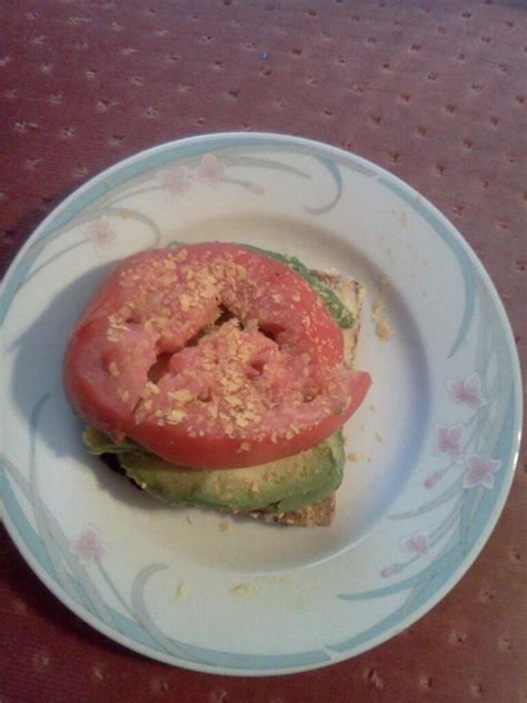 Ezekiel bread toast,hummus,avocado,and tomato,sprinkled with ...