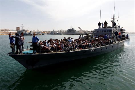 Libya coast guard returns 300 migrants to Tripoli after altercation ...