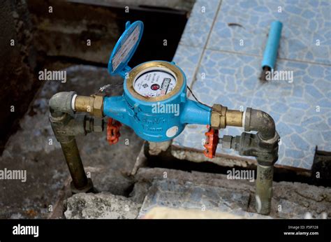 Water meter at home location in Nonthaburi, Thailand Stock Photo - Alamy