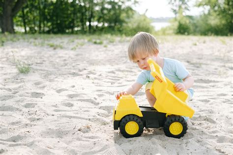 Photo of Orange Dump Truck Toy · Free Stock Photo