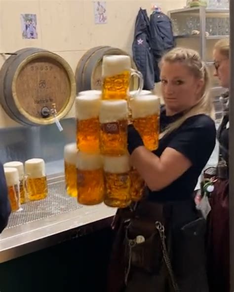 Woman carries impressive amount of beers at Oktoberfest | Whoever this ...