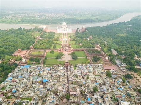 Aerial view of Taj Mahal surrounded by trees and houses, Agra, Uttar ...