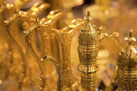 Souvenir gold plated traditional Arabic tea urns, Dubai Mall, Dubai ...