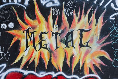 Metal Music Graffiti Painted on a Wall · Free Stock Photo