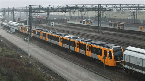 First new Tyne and Wear Metro train arrives in UK - BBC News