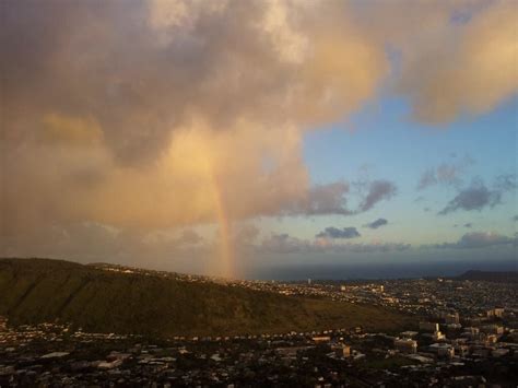 Rainbow at sunset over Manoa Valley as seen from the Tantalus Lookout ...