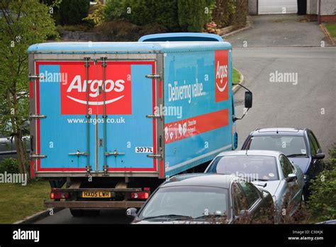 UK, Europe. Argos home delivery van in a narrow suburban street Stock ...