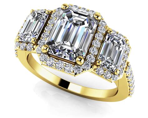 Sparkling Three Stone Emerald Cut Engagement Ring In Platinum Or Gold