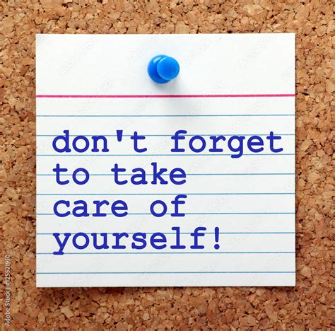 The words Don't Forget to Take Care of Yourself on a note card pinned ...