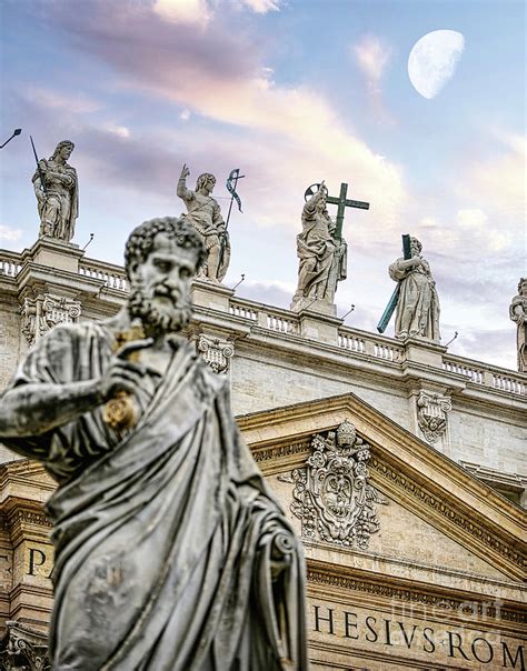 Statue of St Peter holding the key to the gates of heaven in front of ...