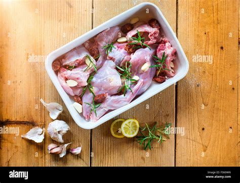 Cooking fresh raw rabbit meat Stock Photo - Alamy