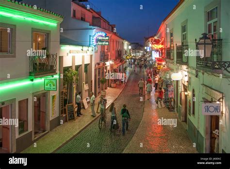 Portugal Algarve Lagos main street. nightlife, restaurants, twilight ...