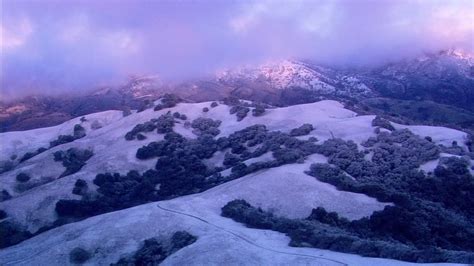 Mountains above Santa Cruz get hit with rare amount of snow - ABC7 San ...