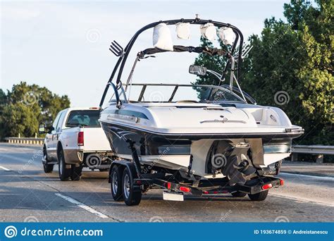 Semi-truck Towing a Boat on the Interstate, California Stock Image ...