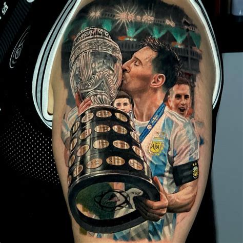 Realistic Messi tattoo located on the upper arm.