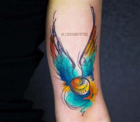 Golden Snitch tattoo by Kiwi Tattoo | Photo 26182